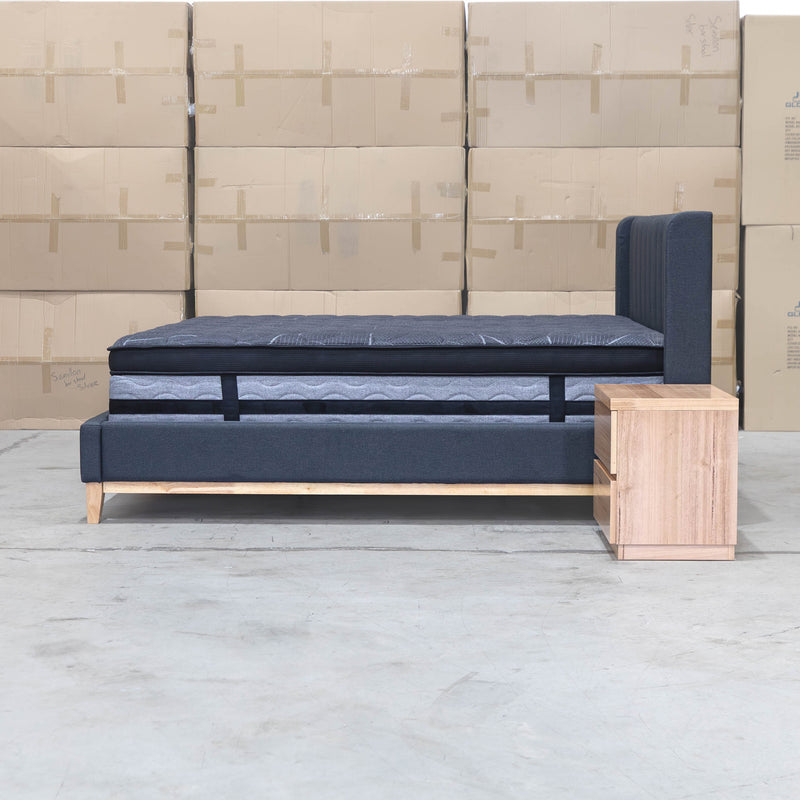 The Paros King Upholstered Bed - Charcoal available to purchase from Warehouse Furniture Clearance at our next sale event.