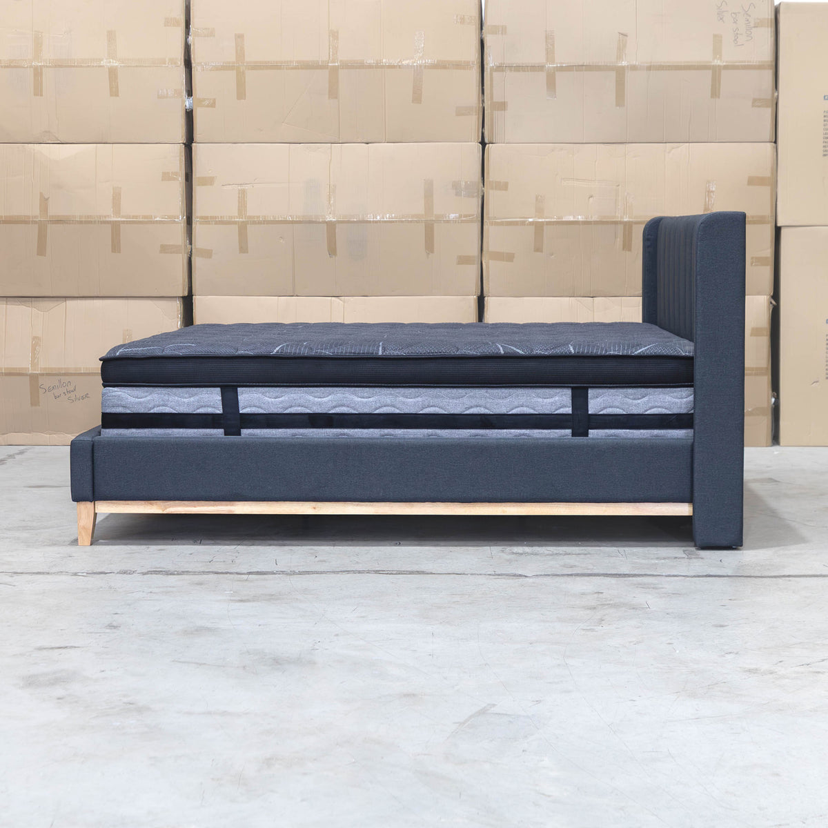 The Paros Double Upholstered Bed - Charcoal - PRE ORDER Available After 23rd October available to purchase from Warehouse Furniture Clearance at our next sale event.