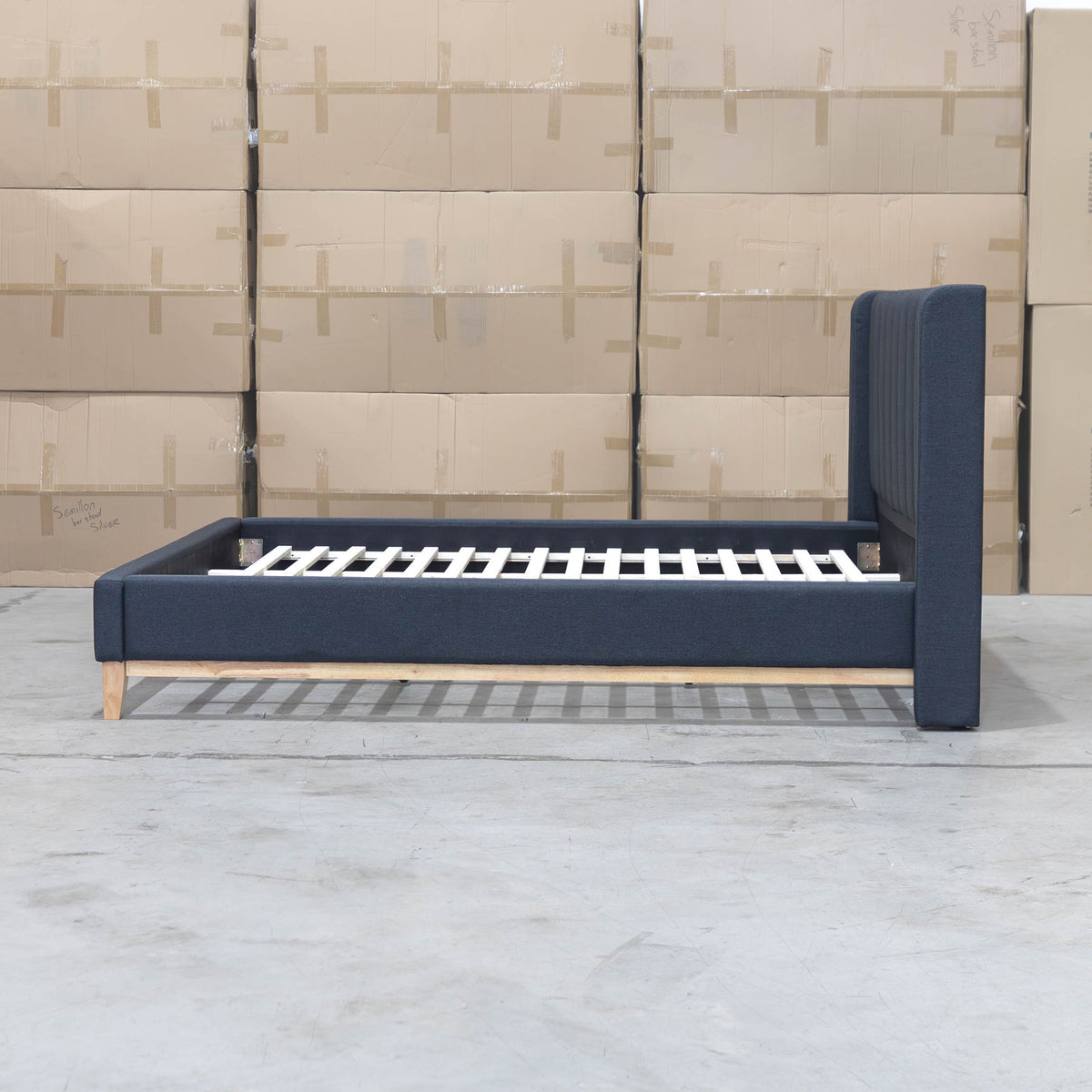 The Paros Double Upholstered Bed - Charcoal - PRE ORDER Available After 23rd October available to purchase from Warehouse Furniture Clearance at our next sale event.