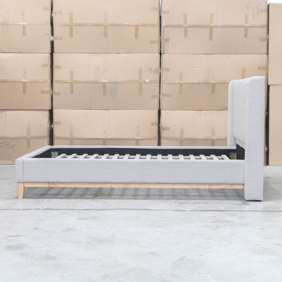 The Paros King Upholstered Bed - Oat White available to purchase from Warehouse Furniture Clearance at our next sale event.