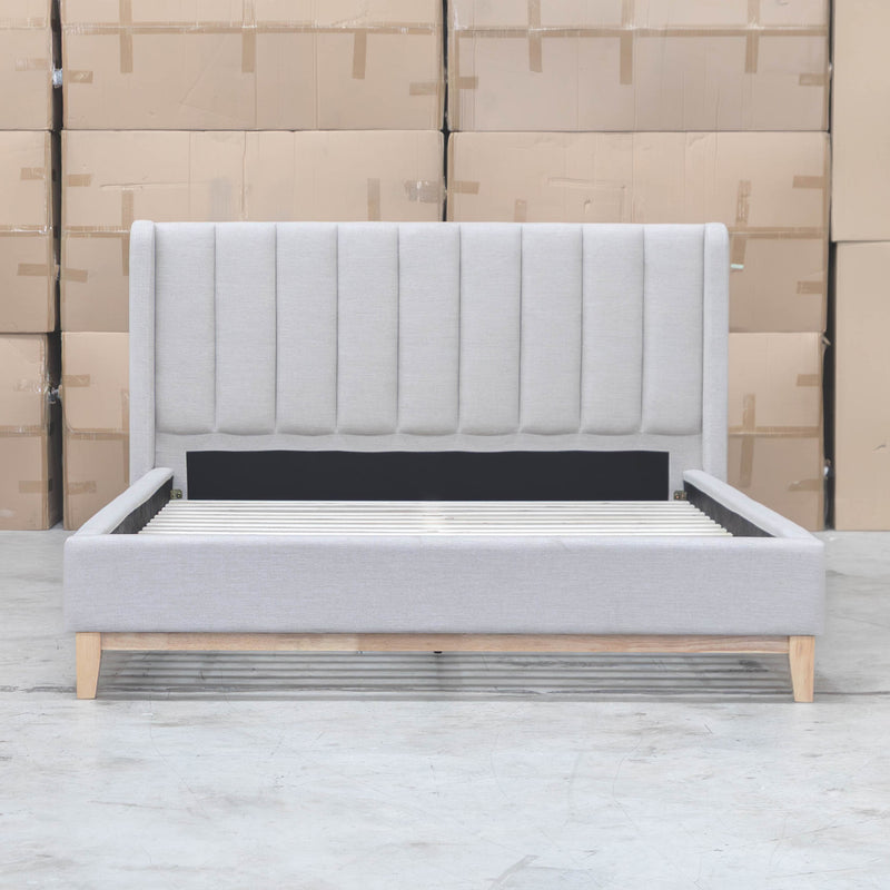 The Paros King Upholstered Bed - Oat White available to purchase from Warehouse Furniture Clearance at our next sale event.