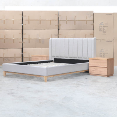 The Paros King Upholstered Bed - Oat White available to purchase from Warehouse Furniture Clearance at our next sale event.