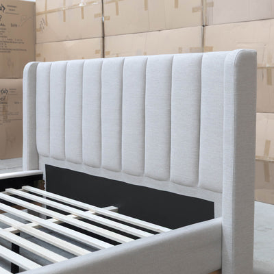The Paros King Upholstered Bed - Oat White available to purchase from Warehouse Furniture Clearance at our next sale event.