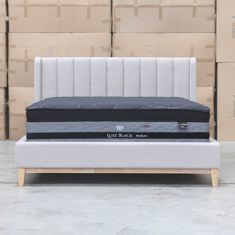 The Paros King Upholstered Bed - Oat White available to purchase from Warehouse Furniture Clearance at our next sale event.