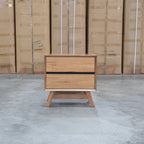 The Polo Marri Harwood Timber Two Drawer Bedside available to purchase from Warehouse Furniture Clearance at our next sale event.
