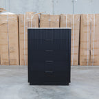 The Province Five Drawer Tallboy - Black & White Jazz Top available to purchase from Warehouse Furniture Clearance at our next sale event.