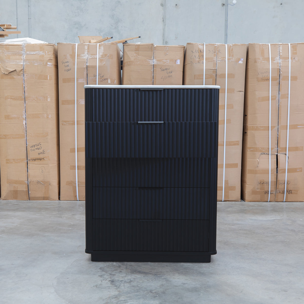 The Province Five Drawer Tallboy - Black & White Jazz Top available to purchase from Warehouse Furniture Clearance at our next sale event.