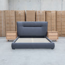 The Quinn Queen Upholstered Bed - Charcoal available to purchase from Warehouse Furniture Clearance at our next sale event.