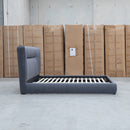 The Quinn Queen Upholstered Bed - Charcoal available to purchase from Warehouse Furniture Clearance at our next sale event.