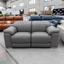 The RS-11583-PR Two seat full leather dual motor recliner - Elephant - Floor Stock available to purchase from Warehouse Furniture Clearance at our next sale event.