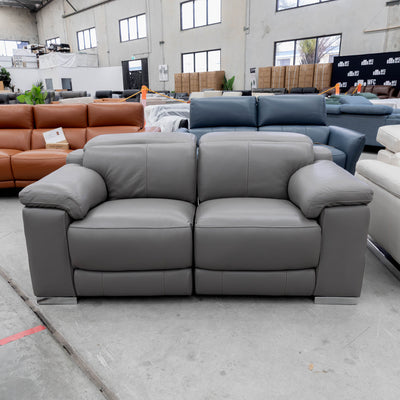 The RS-11583-PR Two seat full leather dual motor recliner - Elephant - Floor Stock available to purchase from Warehouse Furniture Clearance at our next sale event.