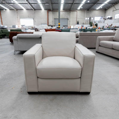 The RS-13125 Single leather armchair - Beige - Floor Stock available to purchase from Warehouse Furniture Clearance at our next sale event.