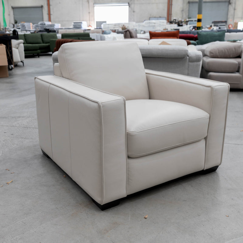 The RS-13125 Single leather armchair - Beige - Floor Stock available to purchase from Warehouse Furniture Clearance at our next sale event.