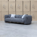The Raven Curved Four Seat Sofa - Charcoal available to purchase from Warehouse Furniture Clearance at our next sale event.