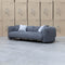 The Raven Curved Four Seat Sofa - Charcoal available to purchase from Warehouse Furniture Clearance at our next sale event.