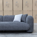 The Raven Curved Four Seat Sofa - Charcoal available to purchase from Warehouse Furniture Clearance at our next sale event.