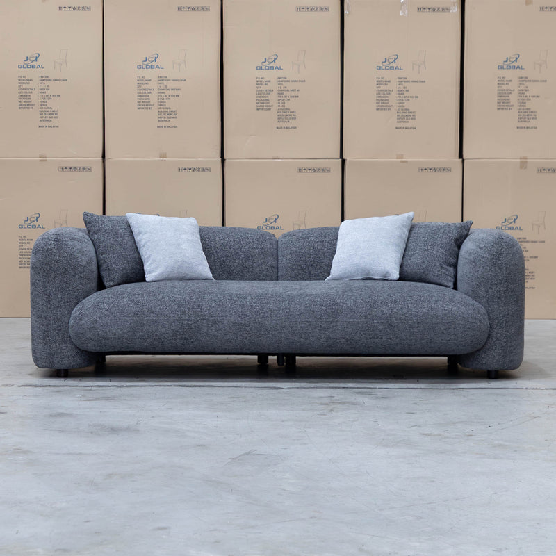 The Raven Curved Three Seat Sofa - Charcoal available to purchase from Warehouse Furniture Clearance at our next sale event.