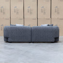 The Raven Curved Three Seat Sofa - Charcoal available to purchase from Warehouse Furniture Clearance at our next sale event.