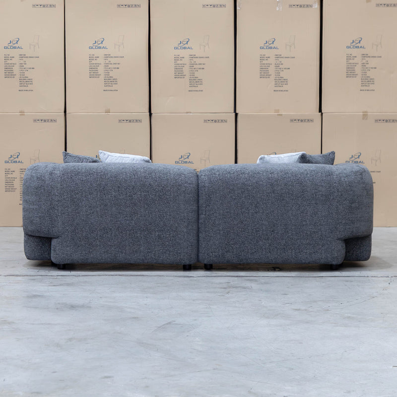 The Raven Curved Three Seat Sofa - Charcoal available to purchase from Warehouse Furniture Clearance at our next sale event.