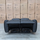 The Lauria Leather Two Seat Triple Motor Recliner Lounge with Air Massager - Black available to purchase from Warehouse Furniture Clearance at our next sale event.