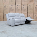 The Connor Three Seat Single Motor Electric Recliner Lounge - Light Grey available to purchase from Warehouse Furniture Clearance at our next sale event.