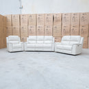 The Seattle Leather Two Seat Triple Motor Recliner Lounge - Beige available to purchase from Warehouse Furniture Clearance at our next sale event.