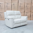 The Seattle Leather Two Seat Triple Motor Recliner Lounge - Beige available to purchase from Warehouse Furniture Clearance at our next sale event.