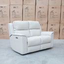 The Seattle Leather Two Seat Triple Motor Recliner Lounge - Beige available to purchase from Warehouse Furniture Clearance at our next sale event.