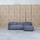 The Rhodes Curved Three Seat Chaise Lounge - Charcoal available to purchase from Warehouse Furniture Clearance at our next sale event.