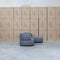 The Rhodes Curved Three Seat Chaise Lounge - Charcoal available to purchase from Warehouse Furniture Clearance at our next sale event.