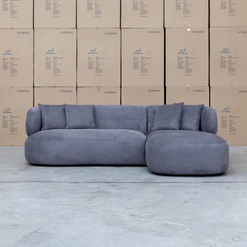 The Rhodes Curved Three Seat Chaise Lounge - Charcoal available to purchase from Warehouse Furniture Clearance at our next sale event.