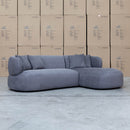 The Rhodes Curved Three Seat Chaise Lounge - Charcoal available to purchase from Warehouse Furniture Clearance at our next sale event.