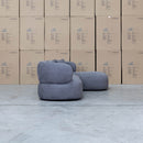 The Rhodes Curved Three Seat Chaise Lounge - Charcoal available to purchase from Warehouse Furniture Clearance at our next sale event.