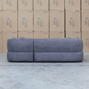 The Rhodes Curved Three Seat Chaise Lounge - Charcoal available to purchase from Warehouse Furniture Clearance at our next sale event.