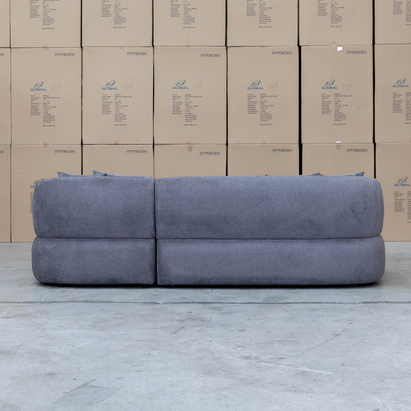 The Rhodes Curved Three Seat Chaise Lounge - Charcoal available to purchase from Warehouse Furniture Clearance at our next sale event.
