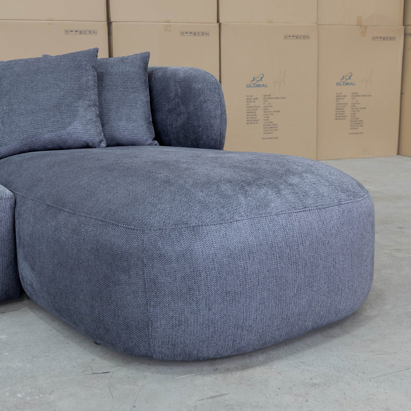 The Rhodes Curved Three Seat Chaise Lounge - Charcoal available to purchase from Warehouse Furniture Clearance at our next sale event.