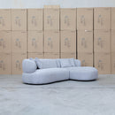 The Rhodes Curved Three Seat Chaise Lounge - Pewter available to purchase from Warehouse Furniture Clearance at our next sale event.