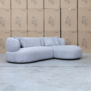 The Rhodes Curved Three Seat Chaise Lounge - Pewter available to purchase from Warehouse Furniture Clearance at our next sale event.