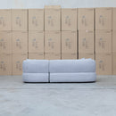 The Rhodes Curved Three Seat Chaise Lounge - Pewter available to purchase from Warehouse Furniture Clearance at our next sale event.