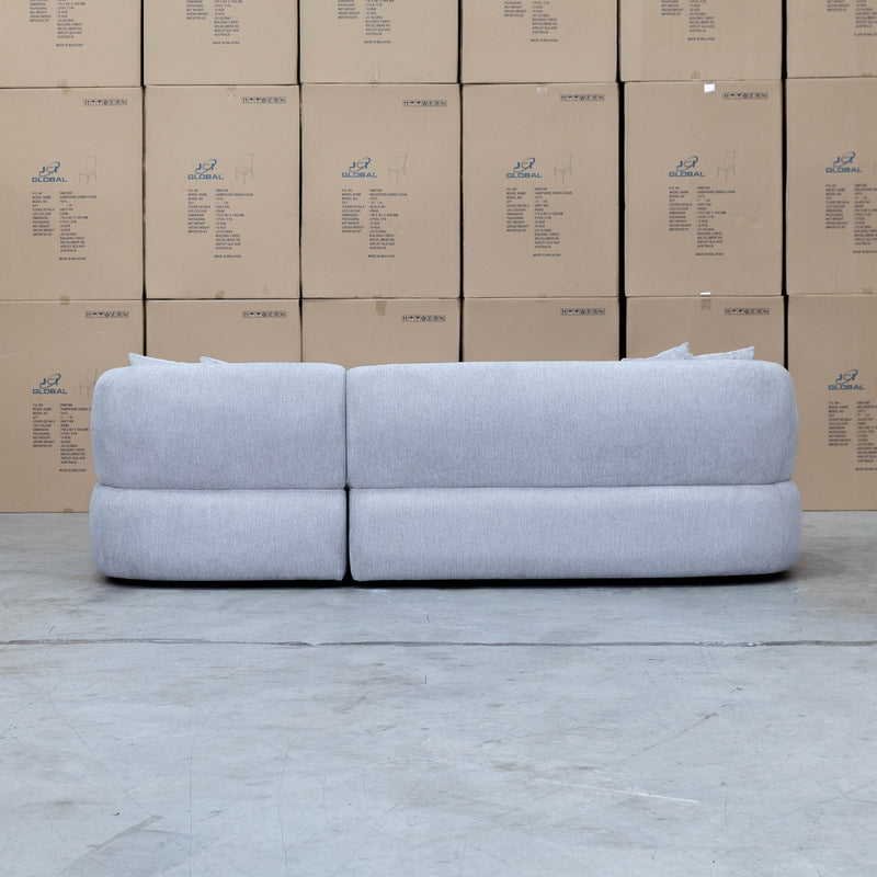 The Rhodes Curved Three Seat Chaise Lounge - Pewter available to purchase from Warehouse Furniture Clearance at our next sale event.