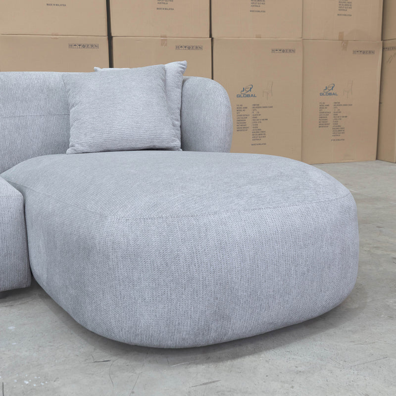 The Rhodes Curved Three Seat Chaise Lounge - Pewter available to purchase from Warehouse Furniture Clearance at our next sale event.