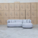 The Rhodes Curved Three Seat Chaise Lounge - Pewter available to purchase from Warehouse Furniture Clearance at our next sale event.