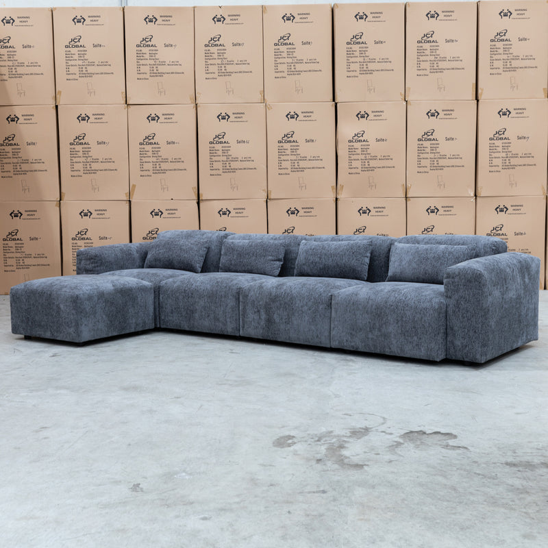 The Rome Four Seat Lounge with Ottoman - Licorice available to purchase from Warehouse Furniture Clearance at our next sale event.