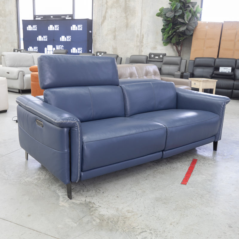 The Samantha Electric Dual Motor 2 Seat Sofa - Blue Leather - Floor Stock As Is available to purchase from Warehouse Furniture Clearance at our next sale event.
