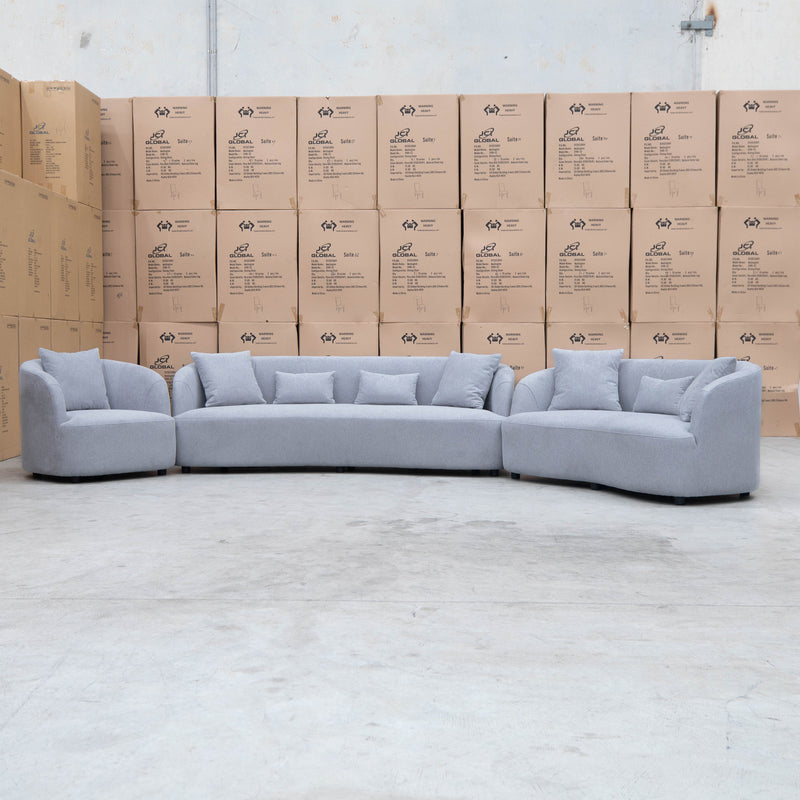 The Santorini Curved Two Seat Sofa - Lance Silver available to purchase from Warehouse Furniture Clearance at our next sale event.