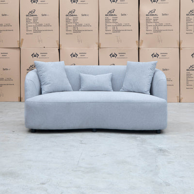 The Santorini Curved Two Seat Sofa - Lance Silver available to purchase from Warehouse Furniture Clearance at our next sale event.