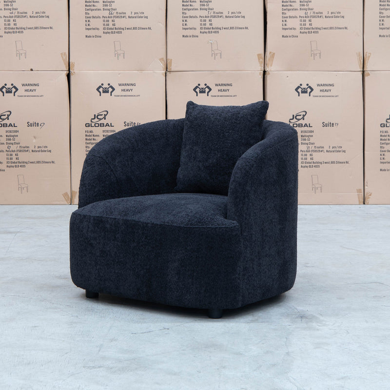 The Santorini Curved Arm Chair - Boucle Black available to purchase from Warehouse Furniture Clearance at our next sale event.