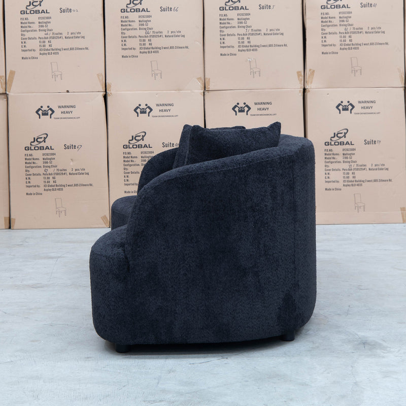 The Santorini Curved Three Seat Sofa - Boucle Black available to purchase from Warehouse Furniture Clearance at our next sale event.