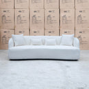 The Santorini Curved Three Seat Sofa - Boucle Ivory available to purchase from Warehouse Furniture Clearance at our next sale event.