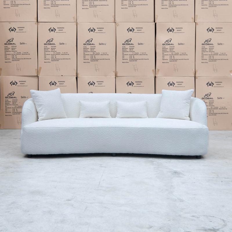 The Santorini Curved Three Seat Sofa - Boucle Ivory - Available After 12th November available to purchase from Warehouse Furniture Clearance at our next sale event.